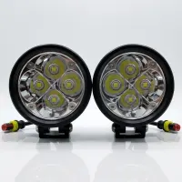 paire de phares LED additionnels ronds 60mm Next‑Tech 50w 15500 lumens 5000K sur fond studio, vue de face éteinte