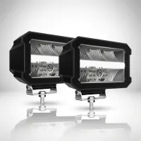 paire de phares LED Next‑Tech rectangulaires 50W homologués E9 sur fond studio blanc, vue de 3/4 avec optiques éteintes
