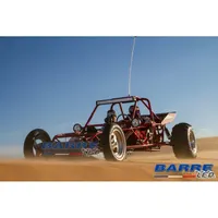 Buggy tout-terrain rouge équipé d'une barre LED roulant sur dunes de sable, application off-road