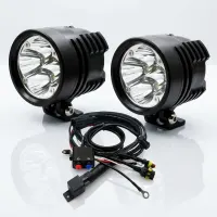 kit phares LED ronds moto Next‑Tech NT-XP4 50w 15500 lumens 5000K avec faisceau et boîtier sur fond studio